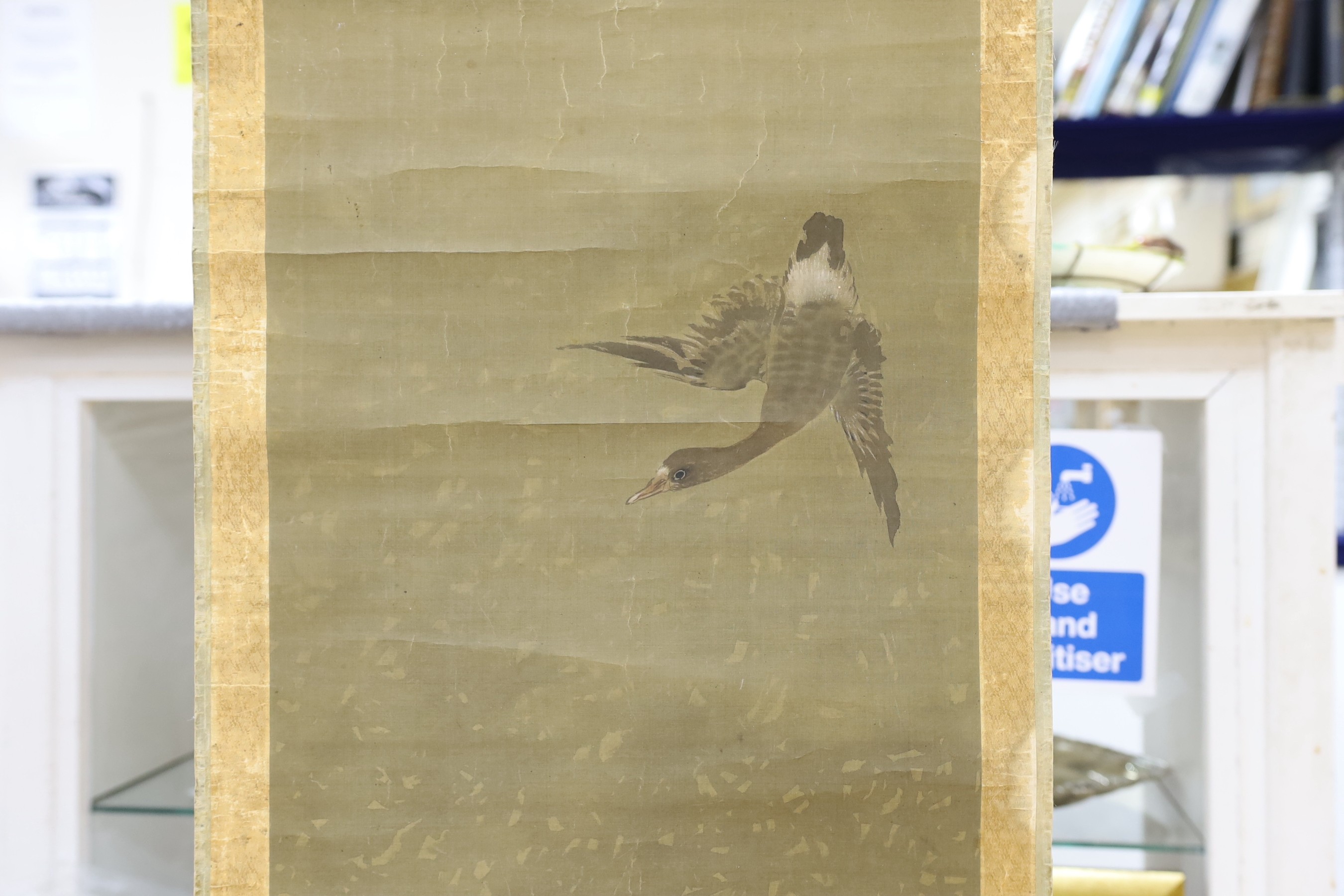 A 19th century Japanese scroll painting on silk of geese, signed, image 102 cm X 36 cm